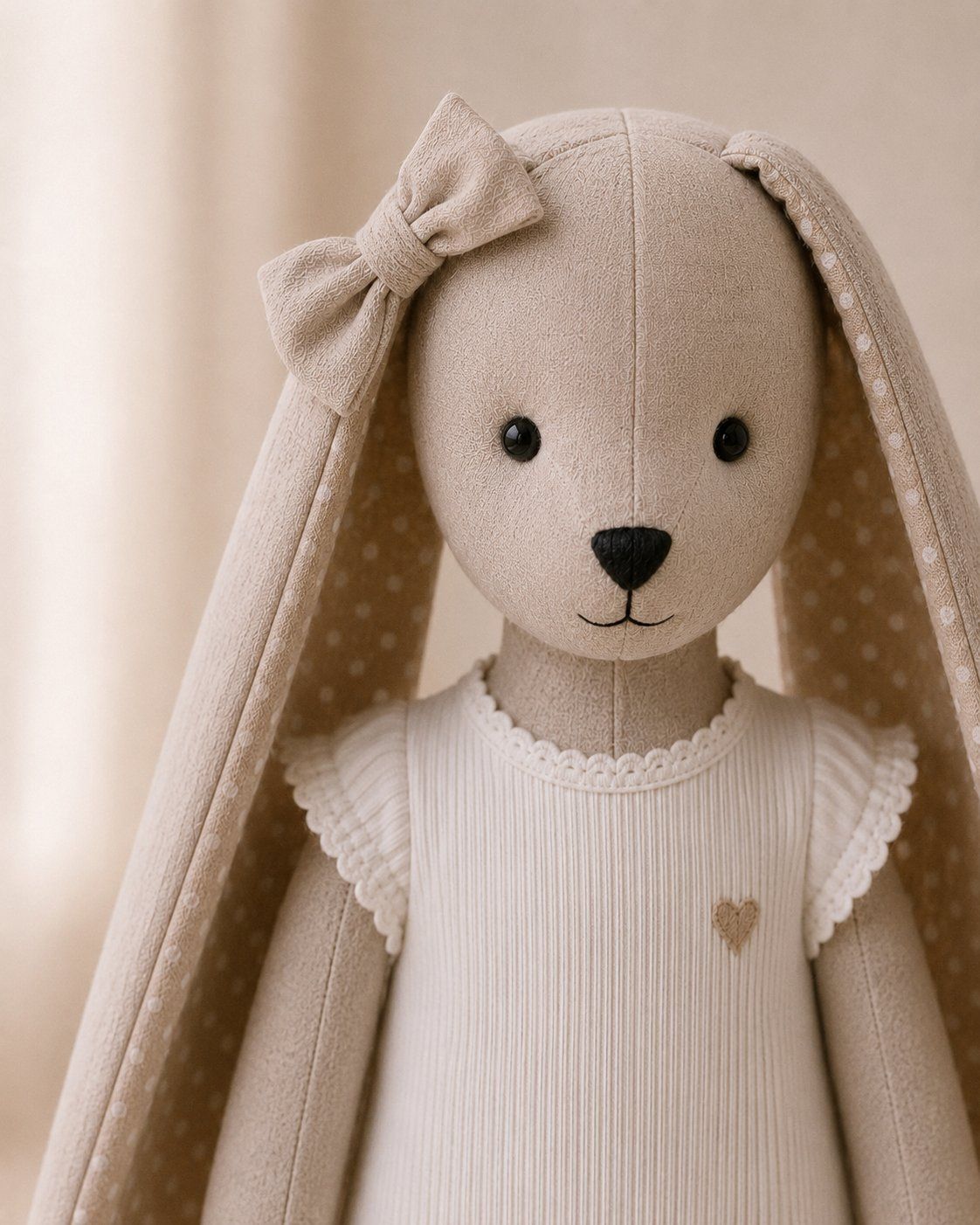 Close-up of a bunny's hand-embroidered face