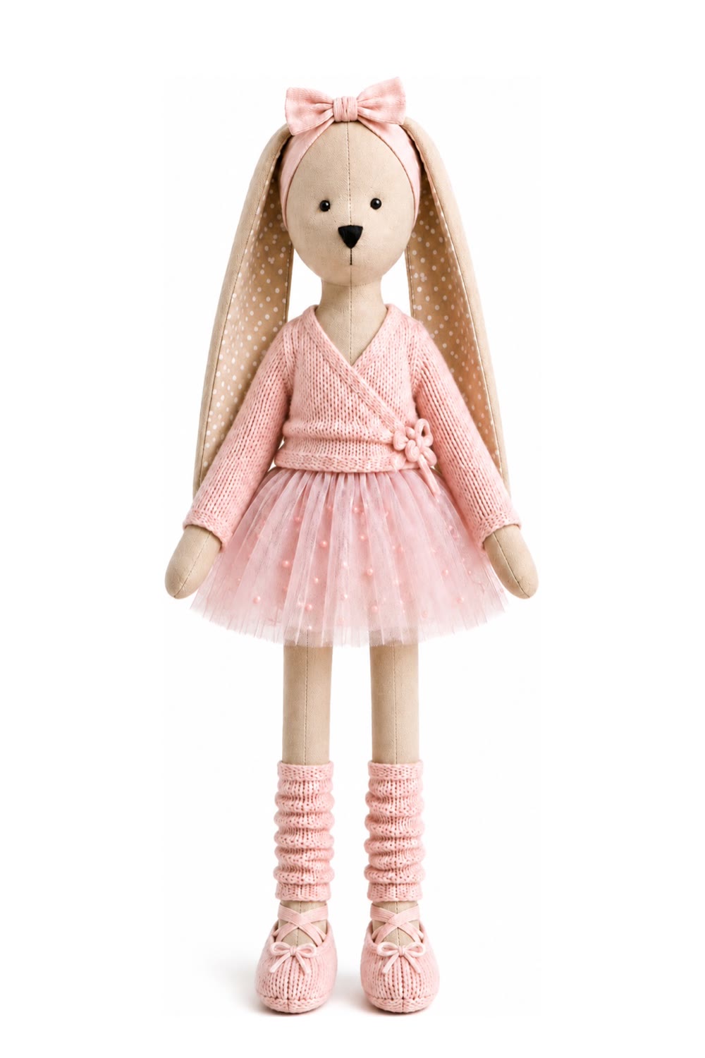 Ballerina bunny in a pink tutu, knitted wrap cardigan and ballet flats